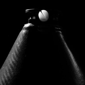 Black and white photograph of The bottom half of a prosthetic leg sheath