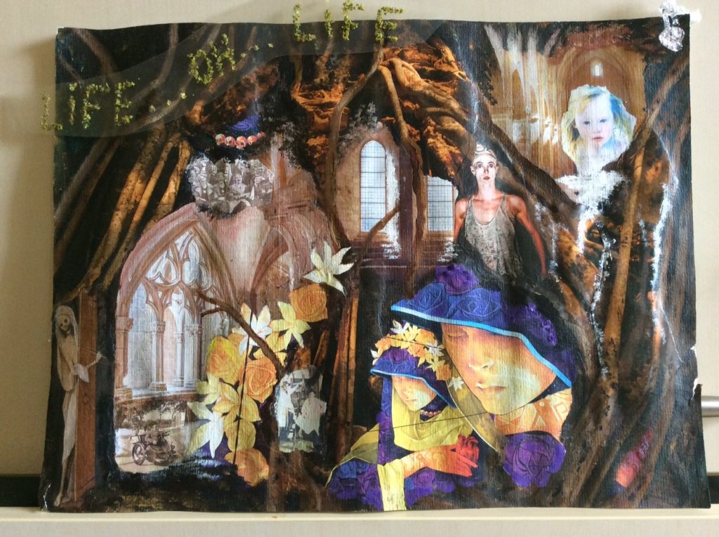 A collage of the inside of a church. Various figures are positioned randomly and include the Virgin Mary and child, a clown, a woman in medievil costume and a skeleton peering around a frame. The words 'Life oh life' hang from the ceiling on clear gauze.